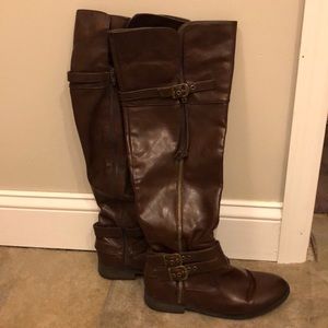 Over the knee or to the knee brown leather boots